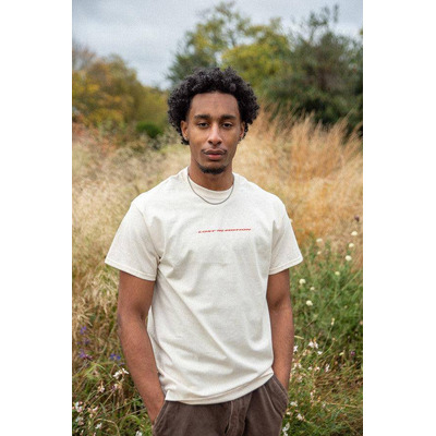 T-Shirt in Neutral With Lost In Motion Logo Print